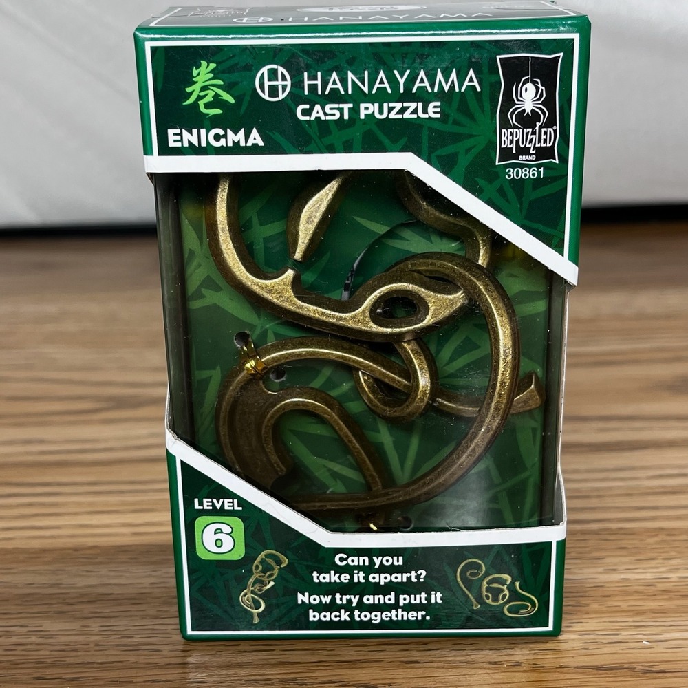Hanayama Enigma Cast Puzzle Metal Level 6 Brain Teaser Bronze New 30861